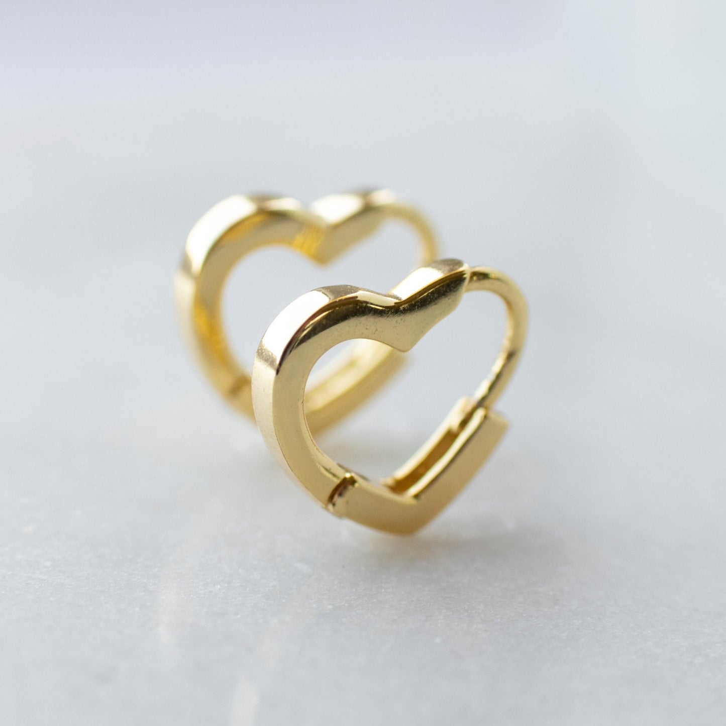 Heart hoop earrings in gold