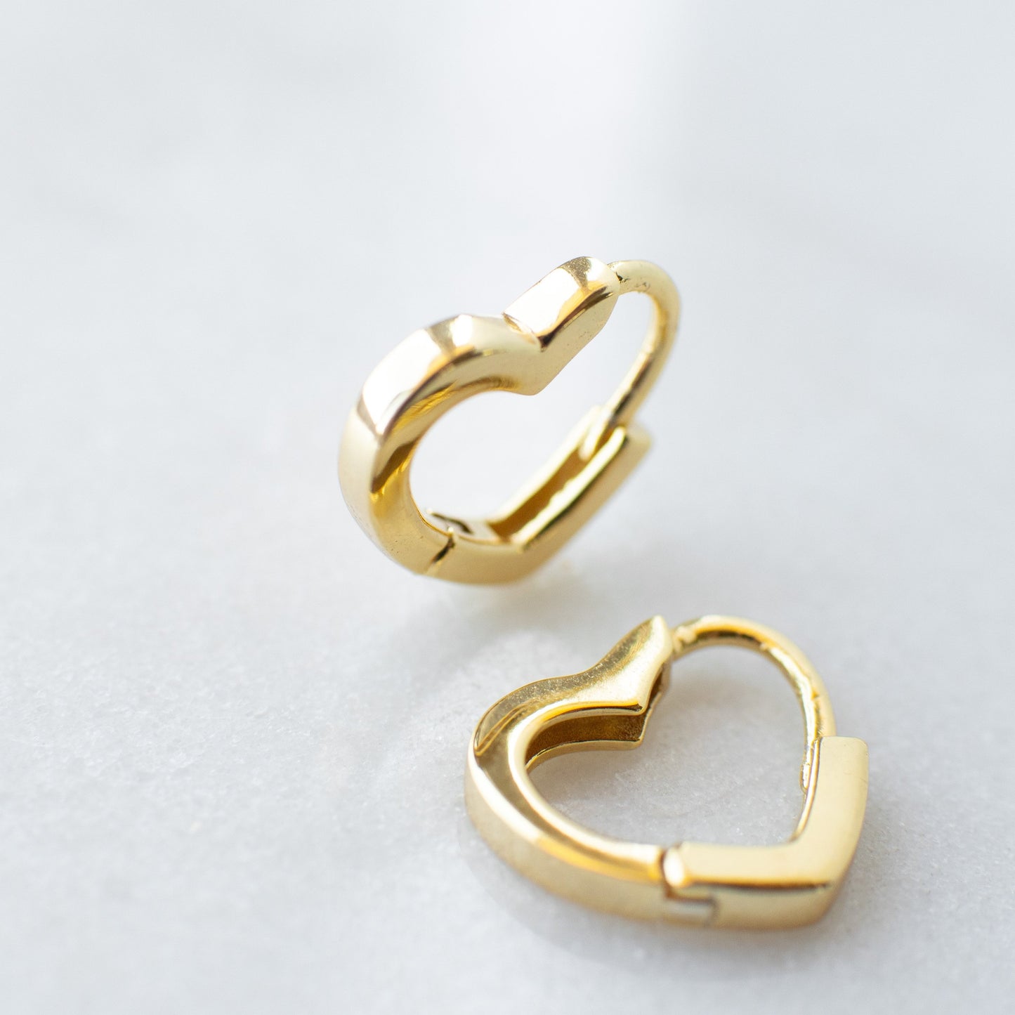 Heart hoop earrings in gold