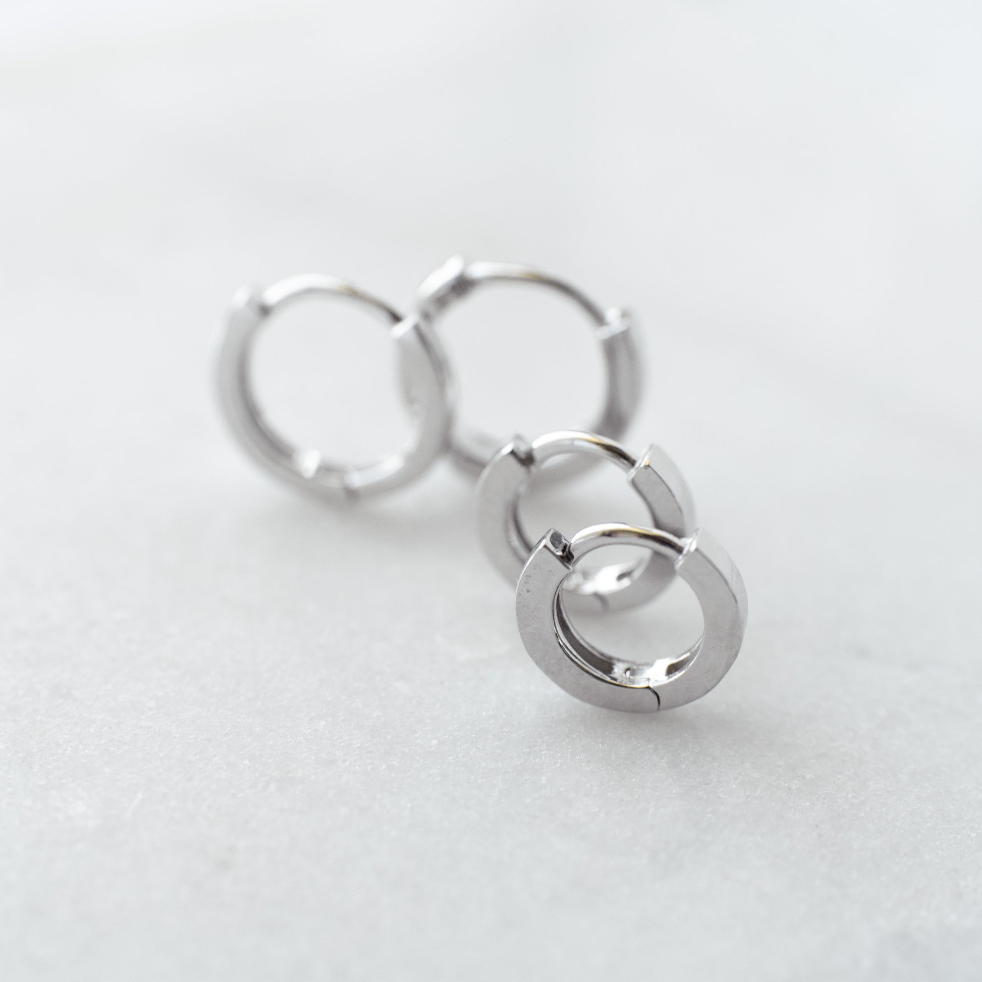 Staple silver huggie hoops