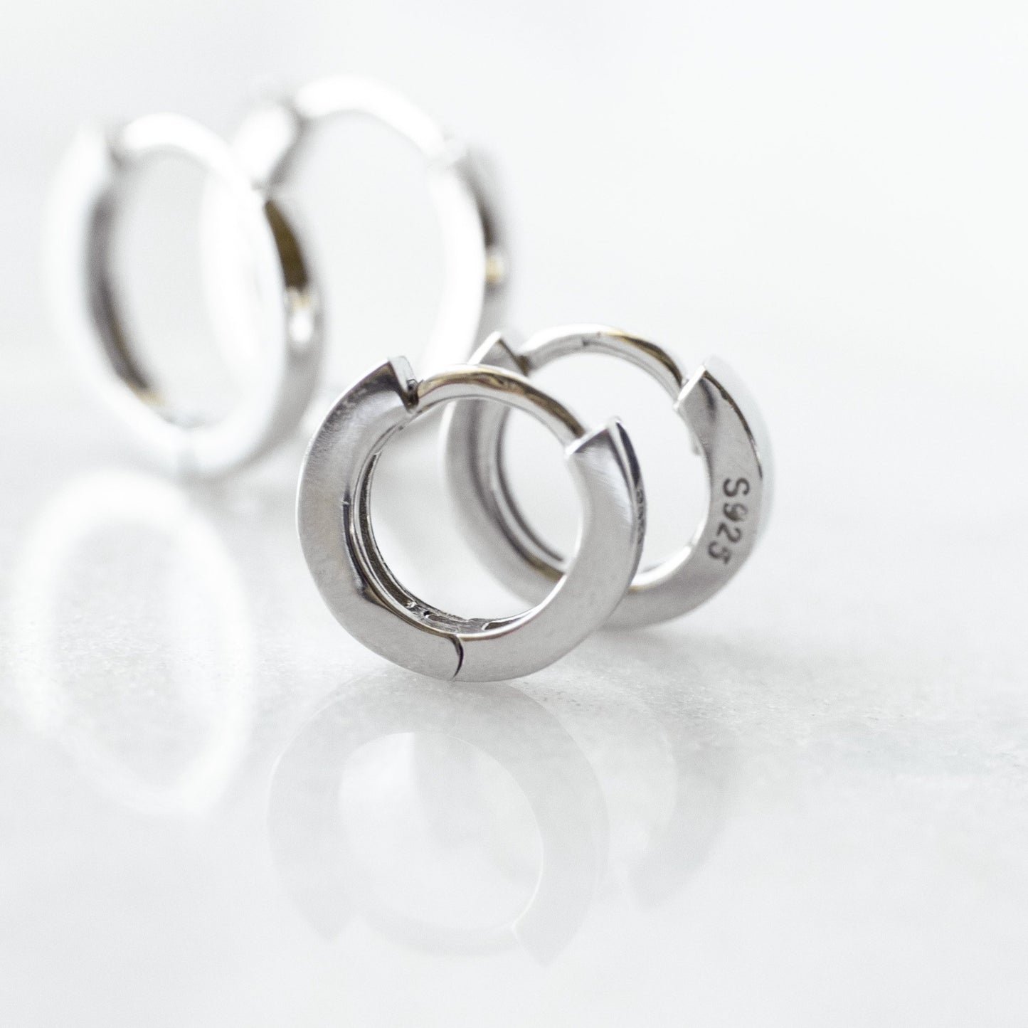 Staple silver huggie hoops