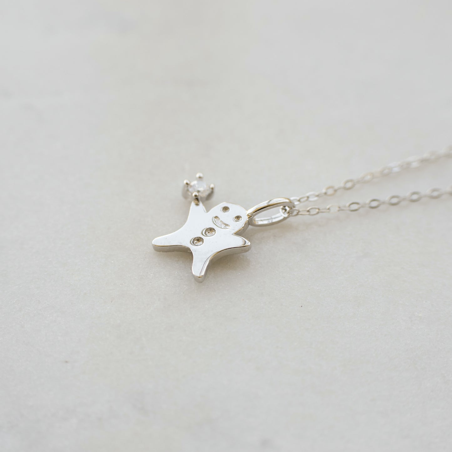 Tiny Silver Gingerbread Man Necklace