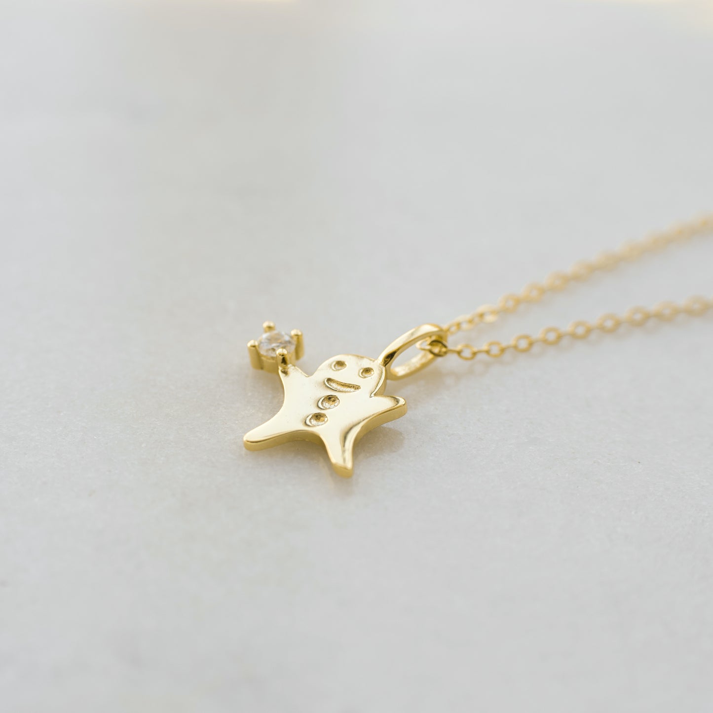 Tiny Gold Gingerbread Man Necklace