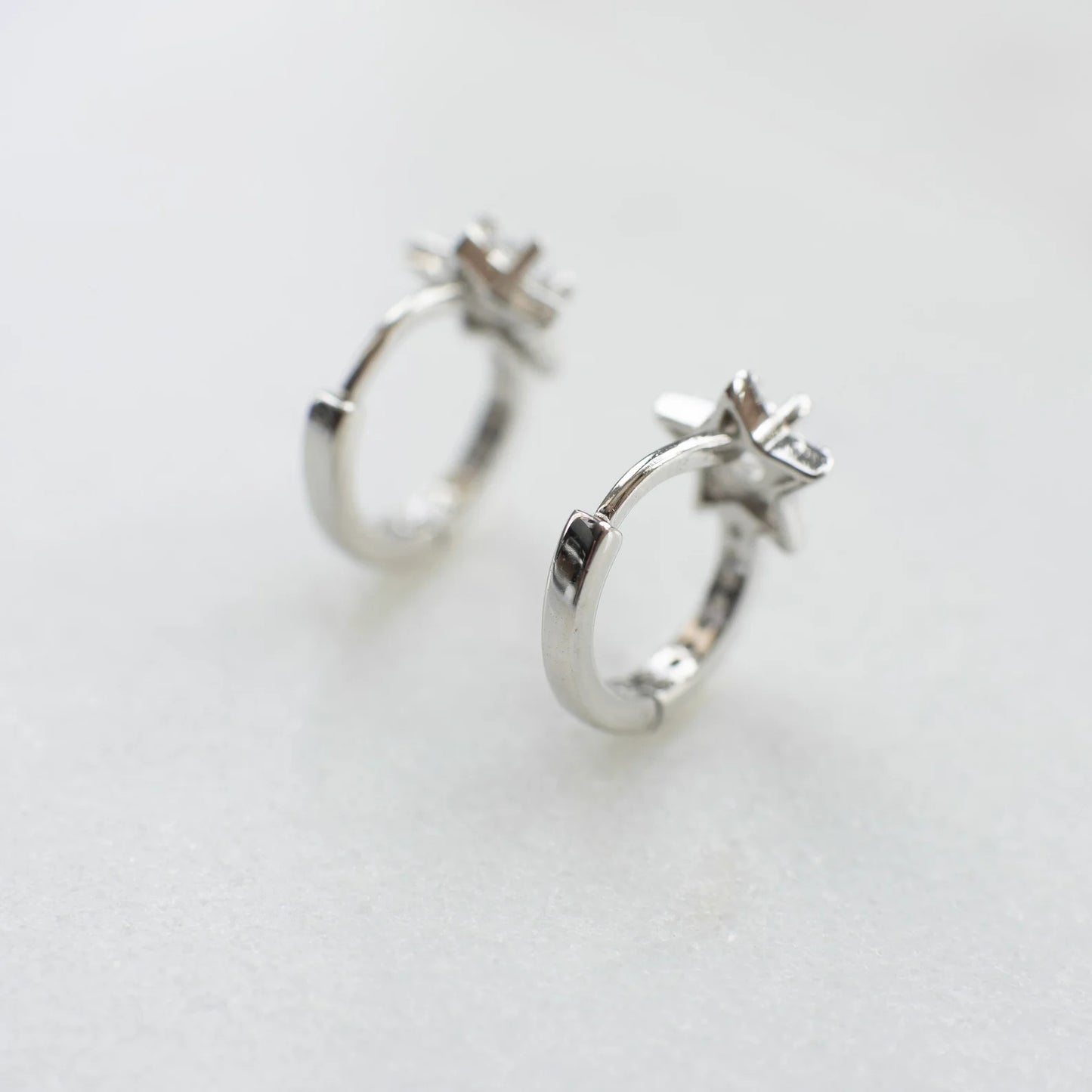 Minimalist Silver Star Huggie Hoops