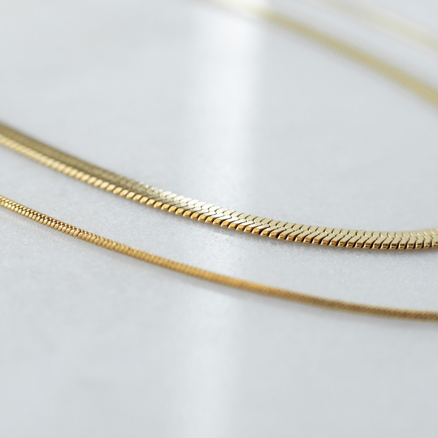 Layered herringbone & snake chain necklace